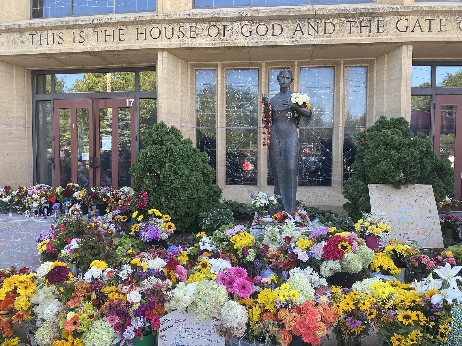 Flowers in front of Annunciation Church and School in Minneapolis Aug. 31 2025 Flowers in front of Annunciation Church and School in Minneapolis