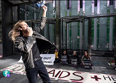 ACT UP & Environmental Activists Block Doors to AI Healthcare Summit ACT UP & Environmental Activists Block Doors to AI Healthcare Summit